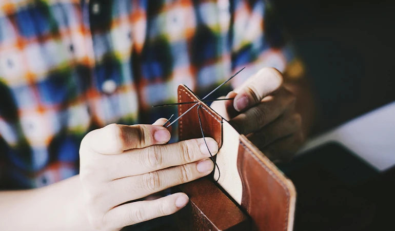 Leather hand stitching from the store’s existing photography